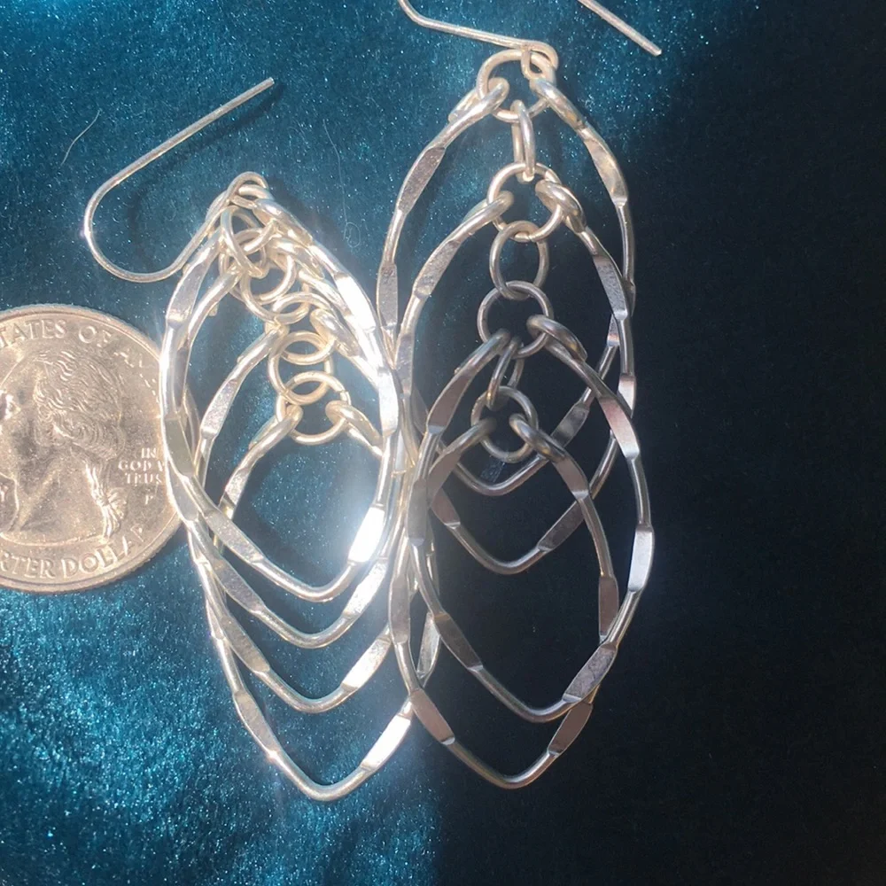 Faceted sparkly faceted swingy silver swingy artisan layered earrings NWOT